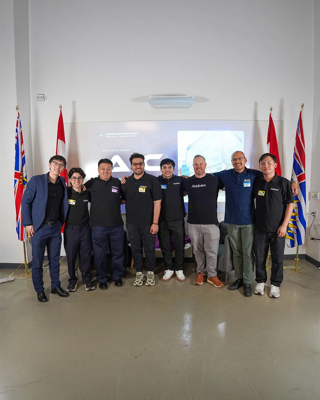 Group photo in front of the Innovation Night stage — photo 1 of 20